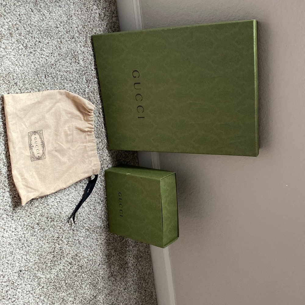 Authentic empty Gucci boxes and a authentic Gucci belt bag cover.